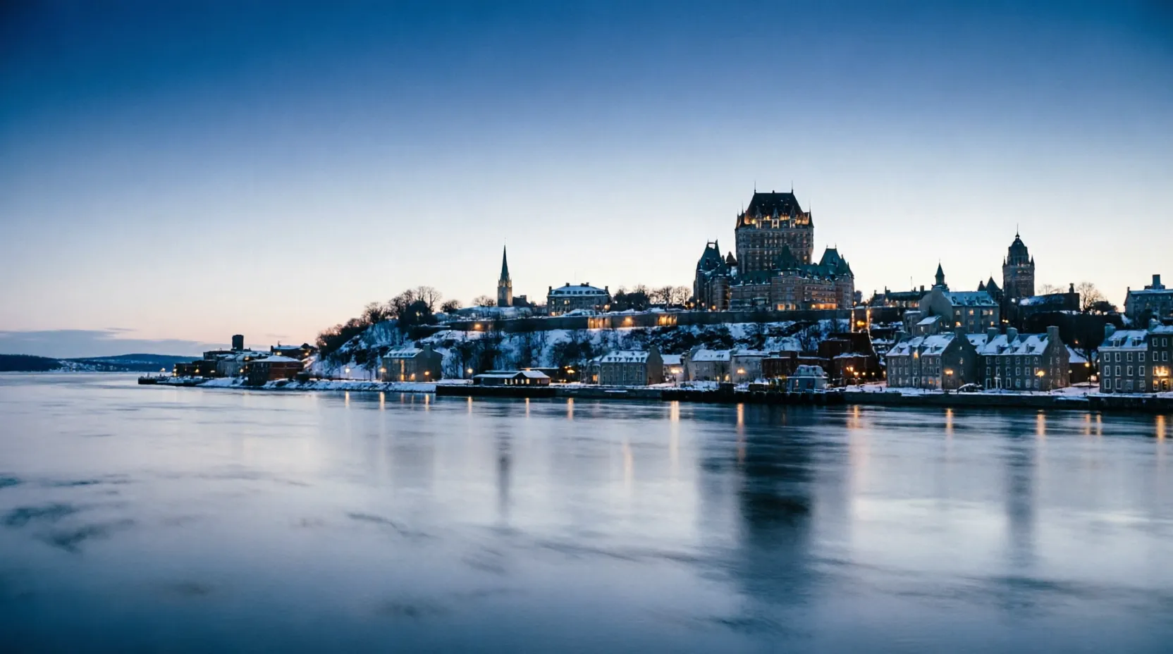 Old Quebec and the St. Lawrence River at blue hour in winter